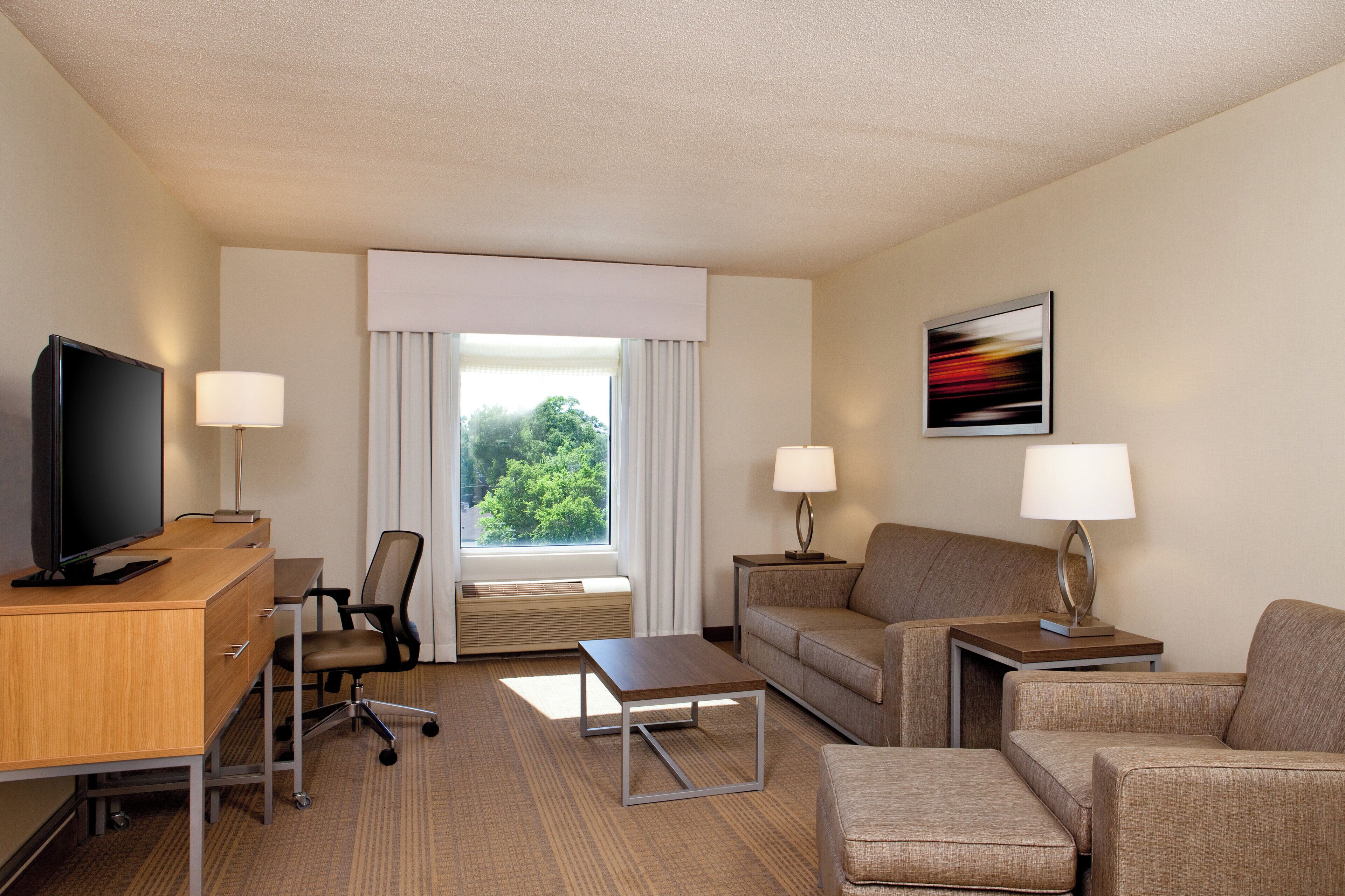 Suite, 2 Queen Beds | Desk, laptop workspace, blackout drapes, soundproofing