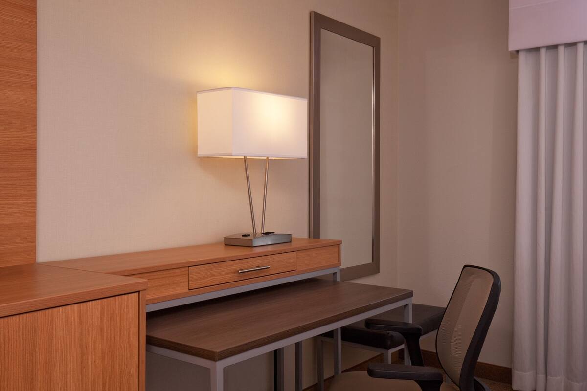 Desk, laptop workspace, blackout curtains, soundproofing