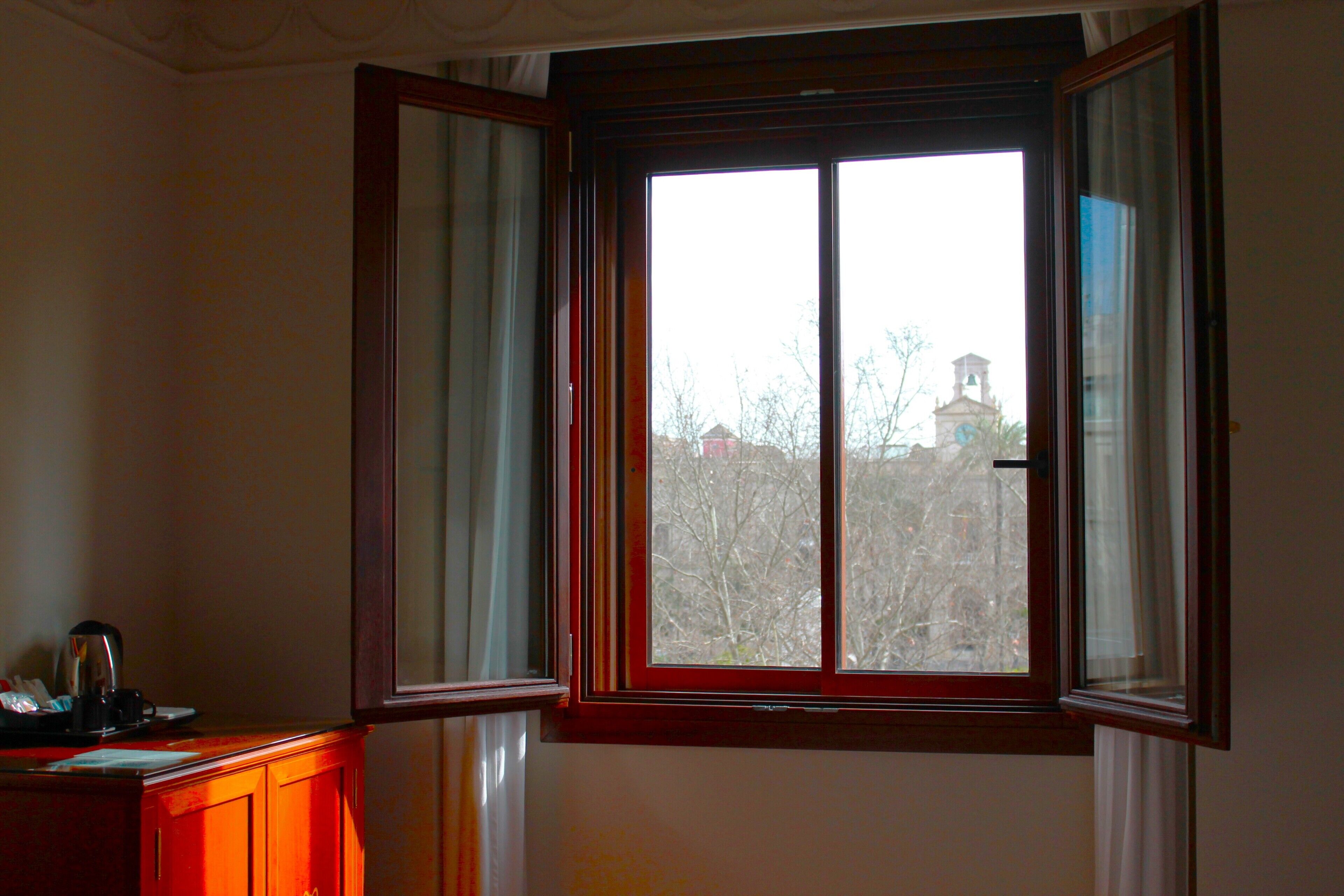 classic double or twin room, city view | minibar, in-room safe, blackout curtains, iron/ironing board