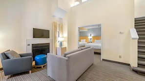 Suite, 2 chambres, cheminée (Loft) | Coin séjour | Télévision à écran plat, Netflix, Hulu, films à la carte