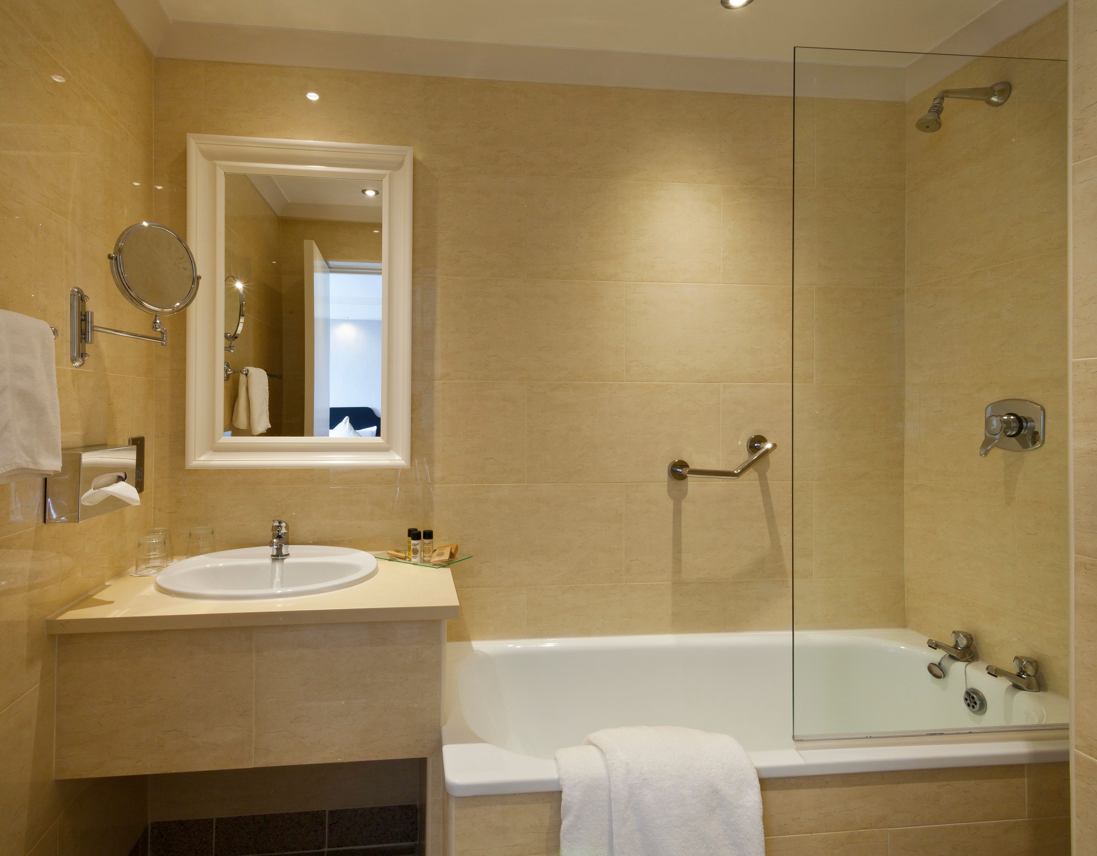 combined shower/bathtub, free toiletries, hair dryer, towels