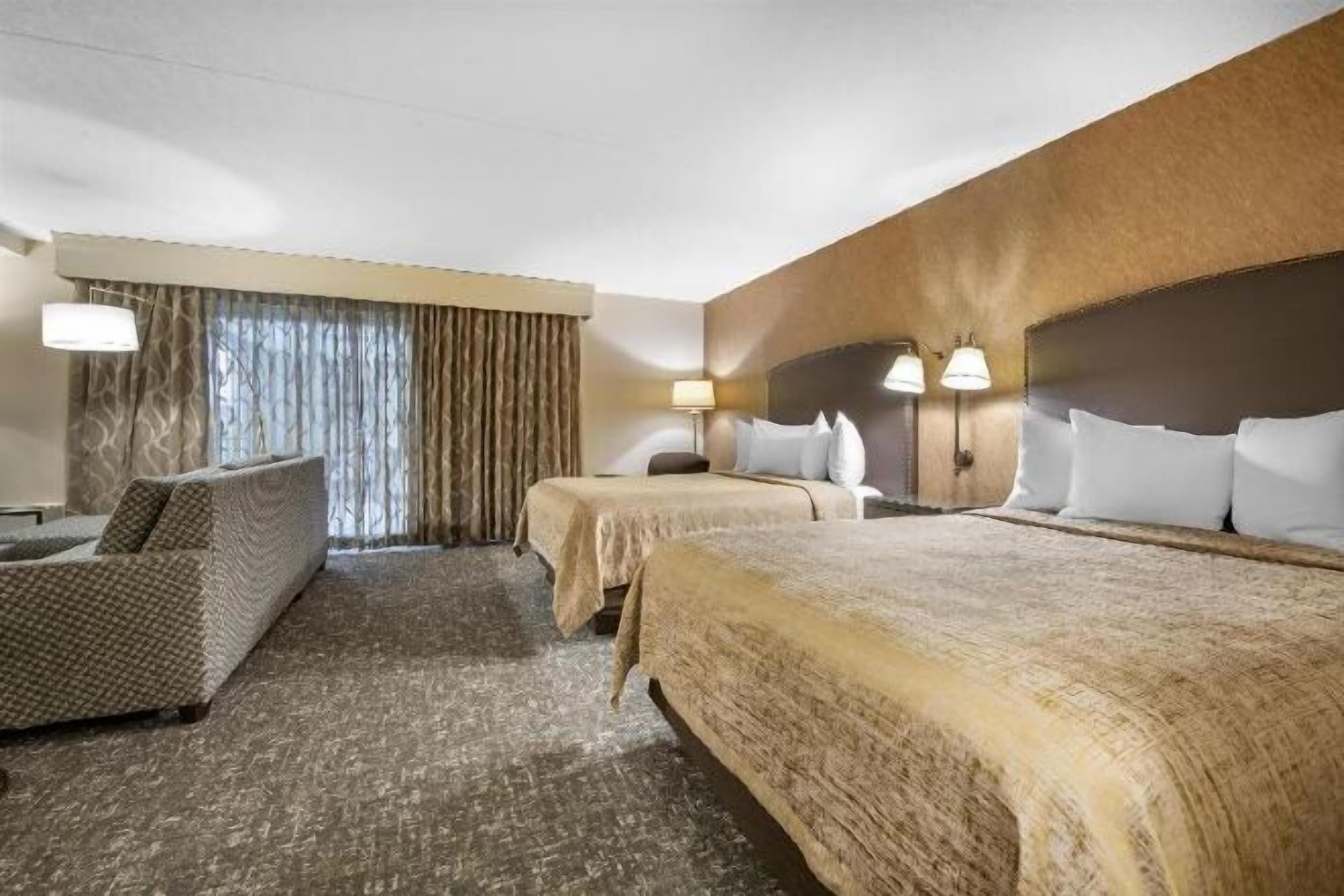 Premium bedding, pillow-top beds, in-room safe, blackout curtains