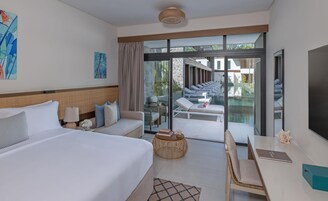 Premium Lagoon Access Room | Pillow-top beds, minibar, in-room safe, desk