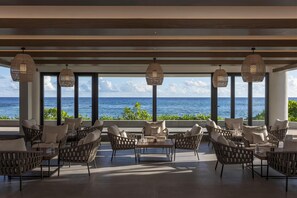 2 bars/lounges, 2 poolside bars, swim-up bar