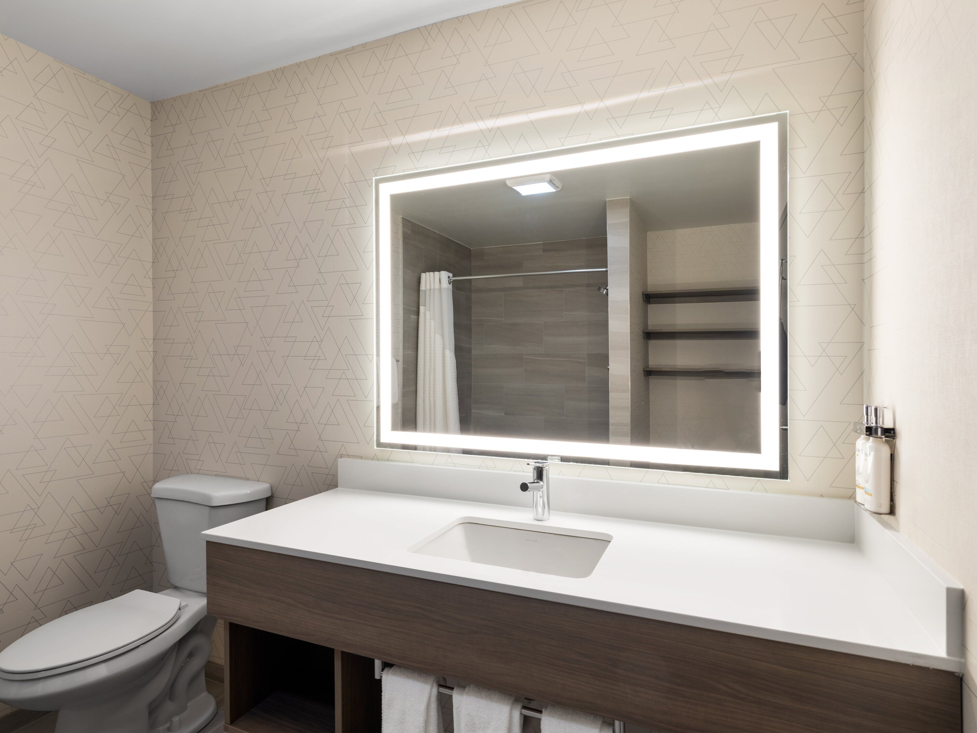 suite, 1 king bed | bathroom | free toiletries, hair dryer, towels, soap