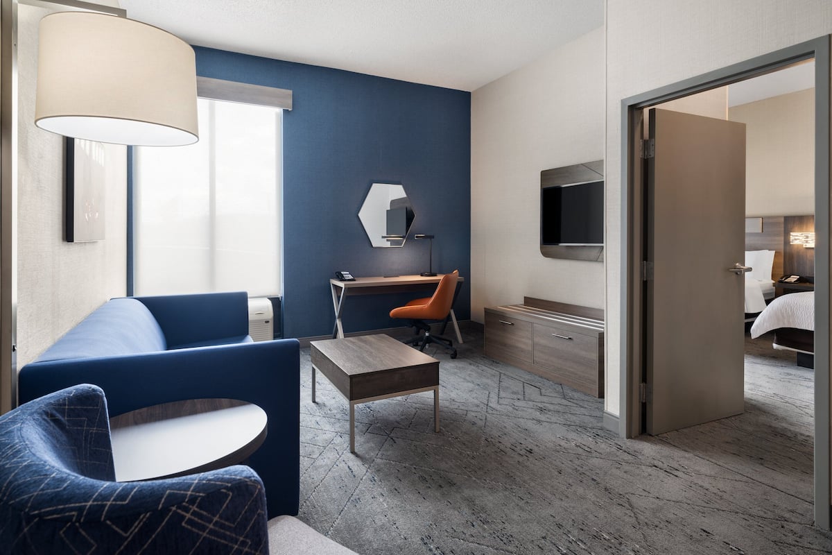 Suite, 1 Bedroom | 1 bedroom, hypo-allergenic bedding, desk, iron/ironing board
