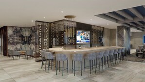 A modern bar area with a wine rack, a TV screen, and bar stools. - DoubleTree by Hilton Raleigh Midtown, NC (Raleigh)