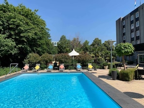 Seasonal outdoor pool, open 9 AM to 9 PM, pool umbrellas, sun loungers