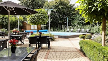 Seasonal outdoor pool, open 9 AM to 9 PM, pool umbrellas, sun loungers