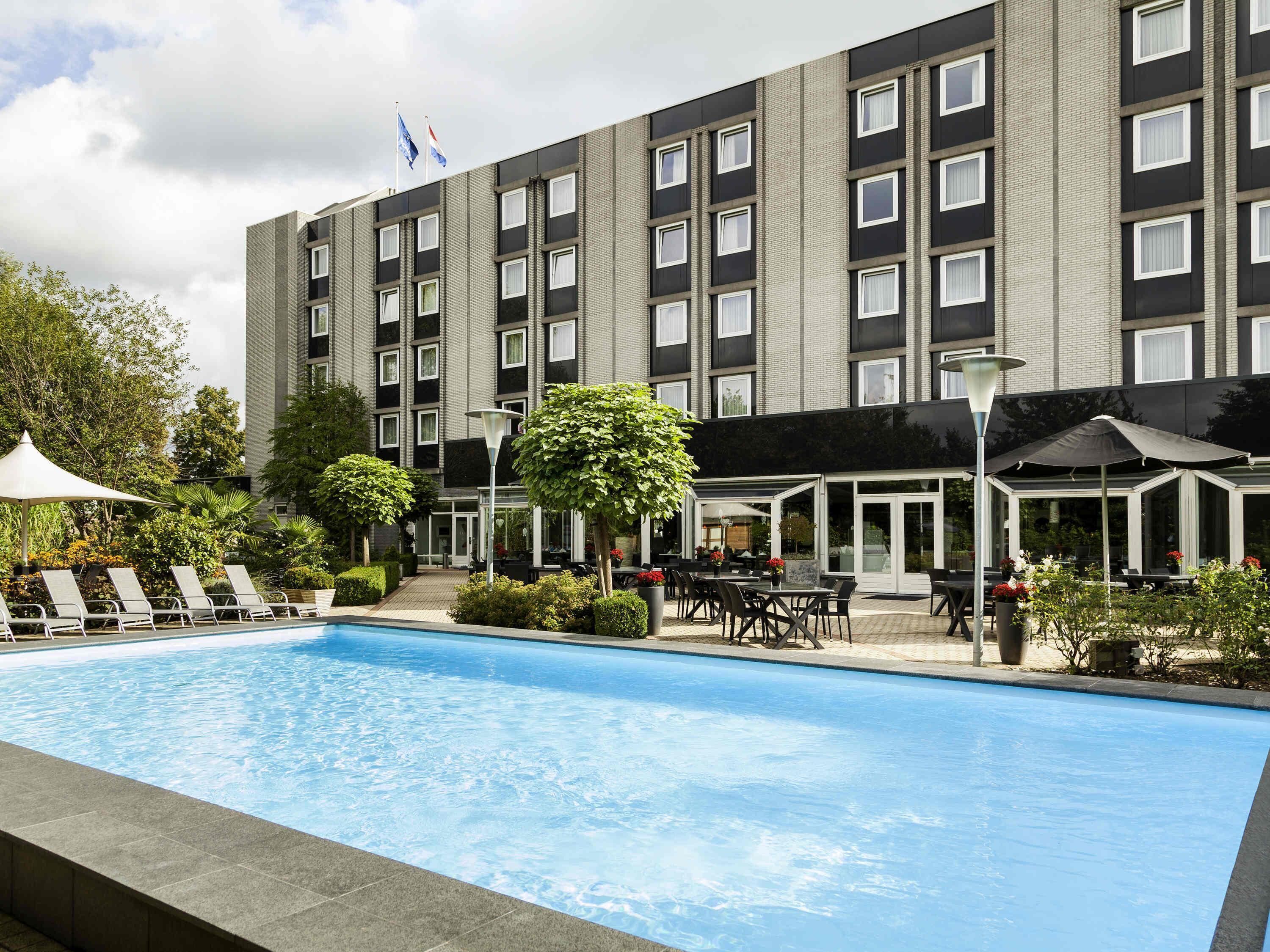 Seasonal outdoor pool, open 9 AM to 9 PM, pool umbrellas, sun loungers