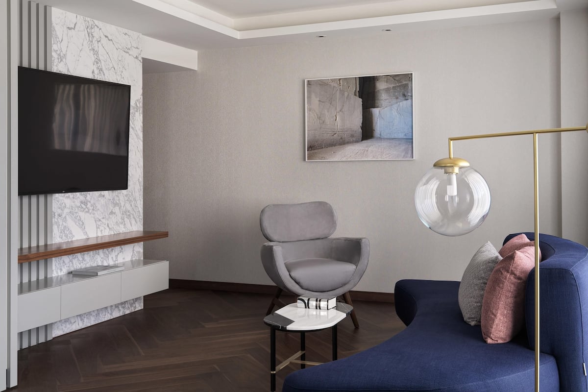 Suite, 1 King Bed, Corner | Minibar, in-room safe, desk, soundproofing