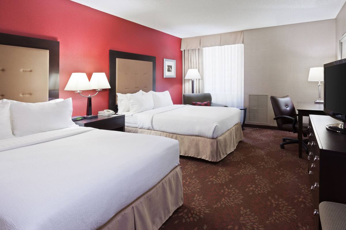 premium bedding, desk, blackout curtains, iron/ironing board