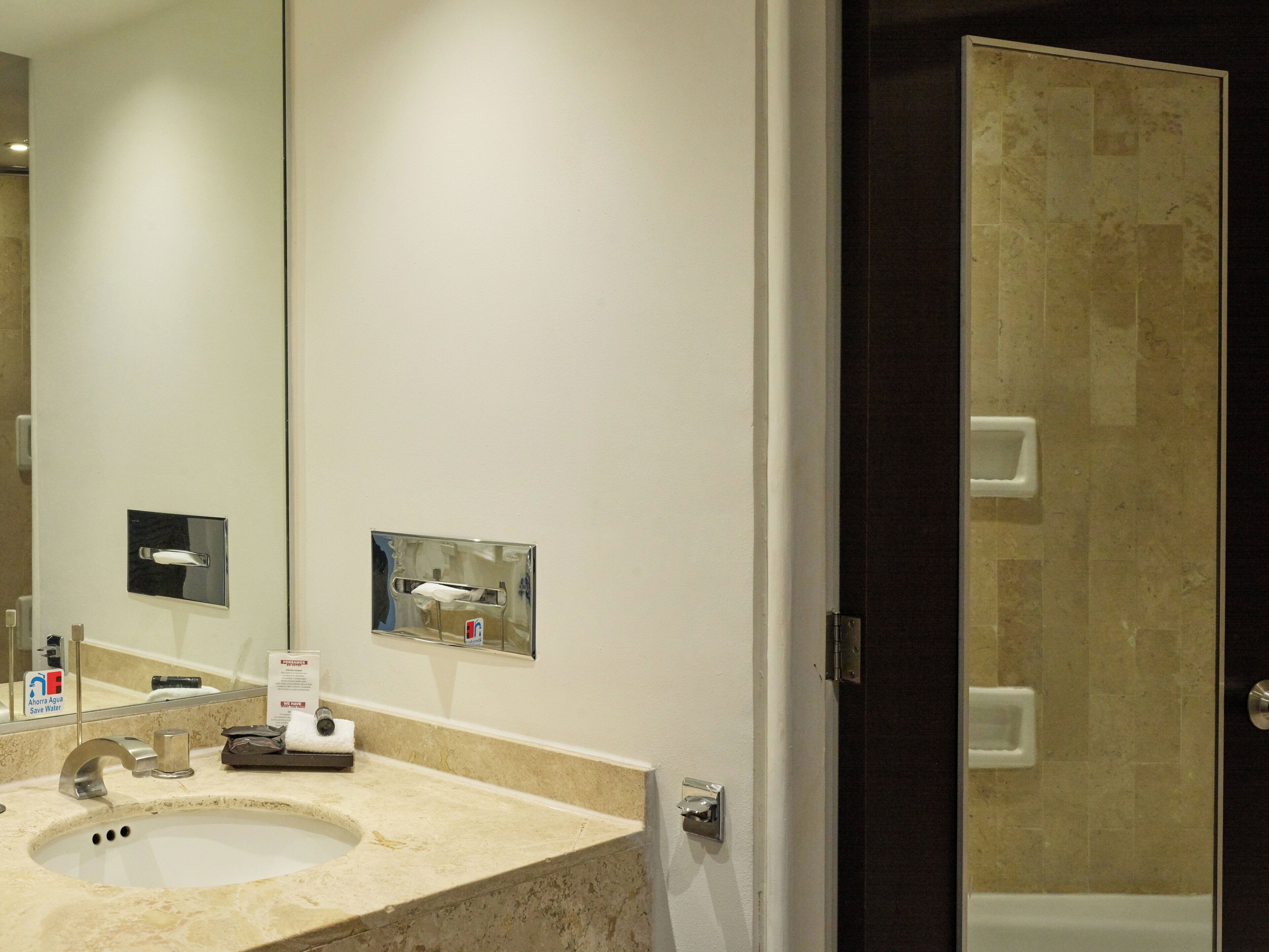 combined shower/bathtub, deep-soaking bathtub, free toiletries