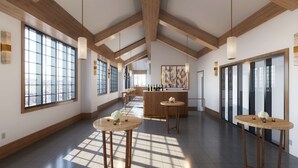 A spacious hotel lobby with large windows, wooden beams, and a central bar area. - The Clift Royal Sonesta San Francisco (San Francisco)
