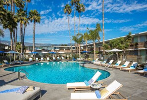 Outdoor pool, open 7:00 AM to 10:00 PM, pool umbrellas, pool loungers