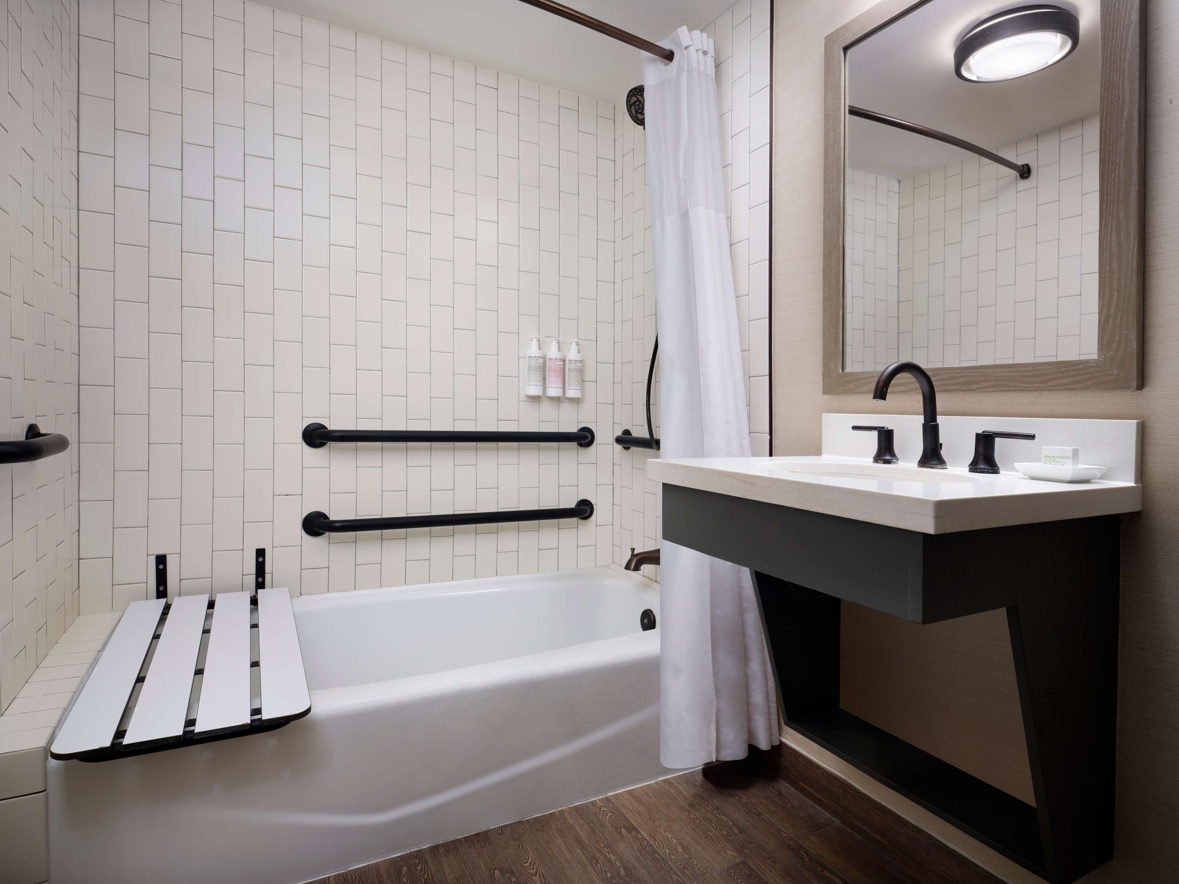 combined shower/bathtub, free toiletries, hair dryer, bathrobes