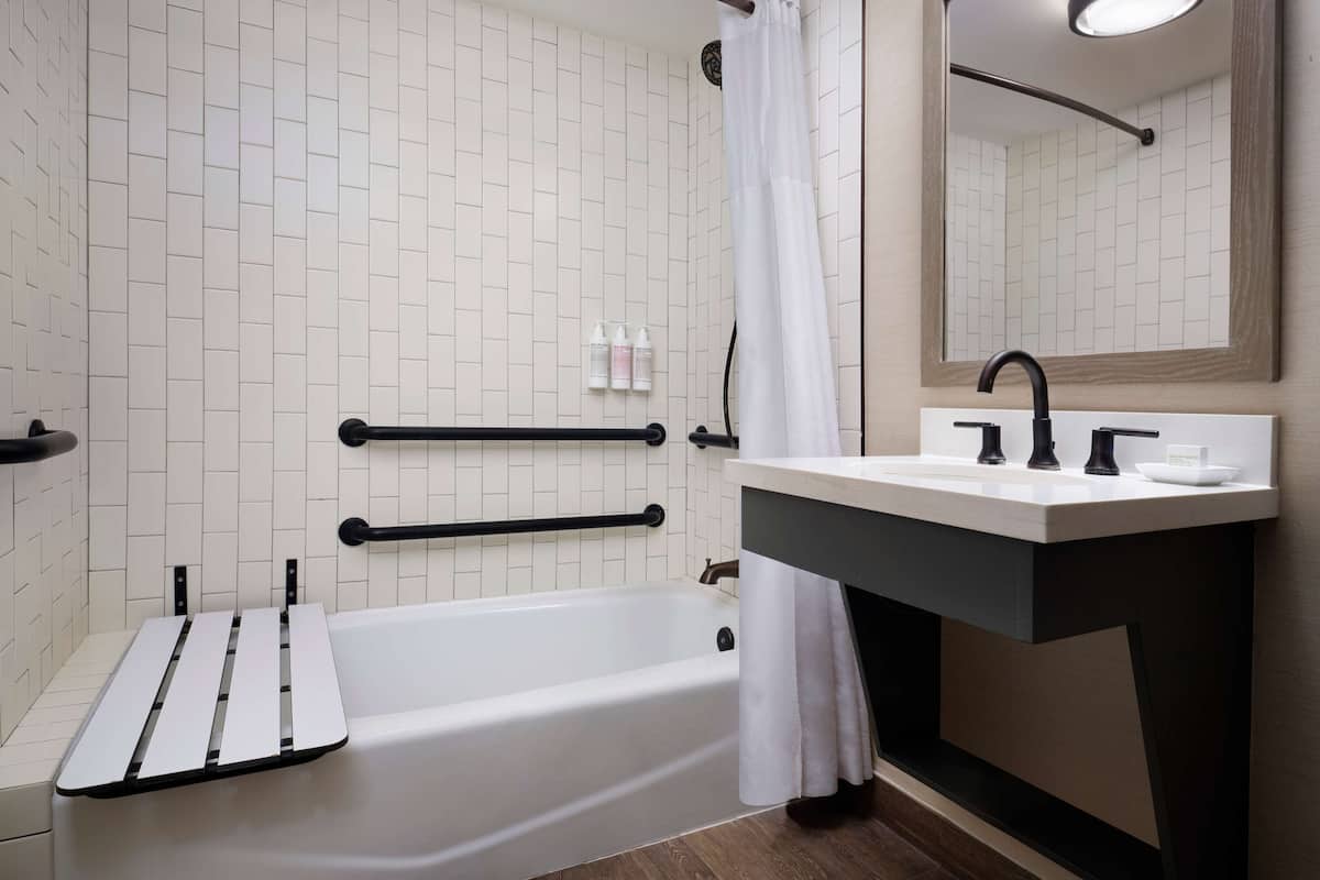 combined shower/bathtub, free toiletries, hair dryer, bathrobes