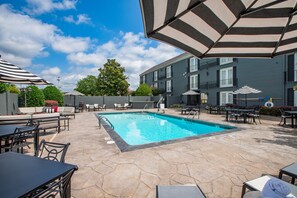 Seasonal outdoor pool, open 9:00 AM to 10:00 PM, pool umbrellas - The Burgundy Hotel, Tapestry Collection by Hilton (Little Rock)
