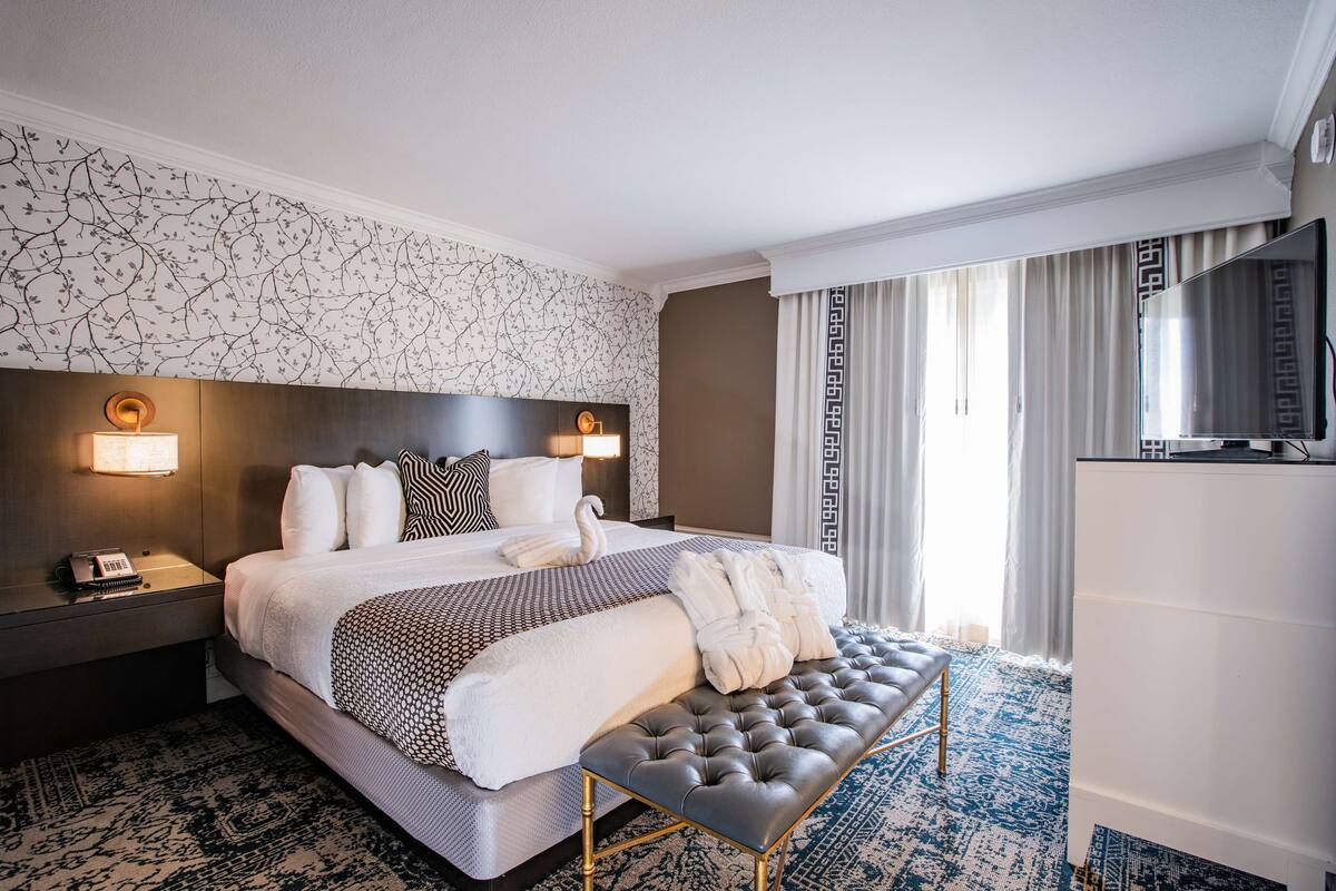 Premium bedding, pillow-top beds, in-room safe, desk