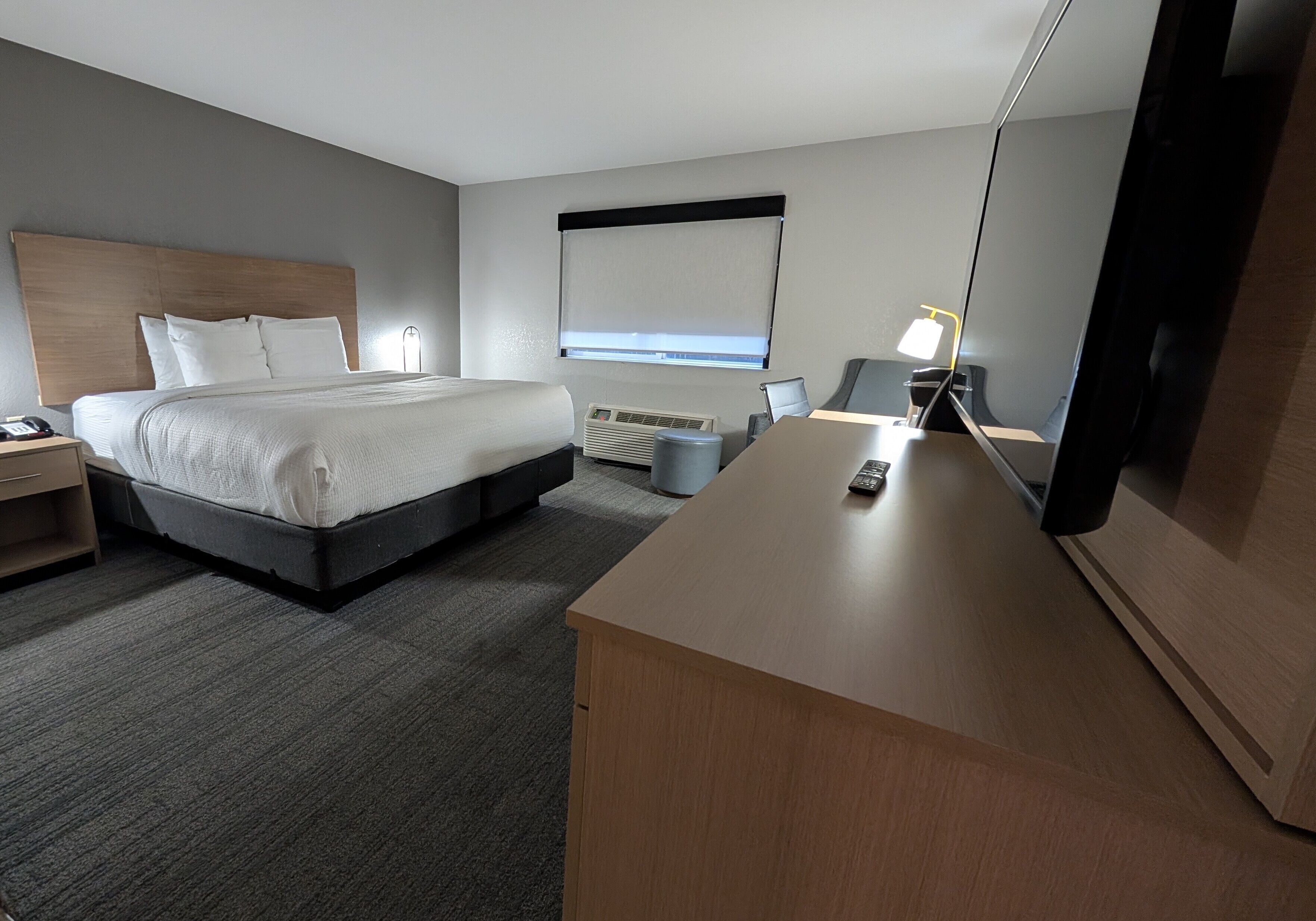 Room, 1 King Bed, Roll-in Shower, Non Smoking | Desk, laptop workspace, iron/ironing board, free WiFi