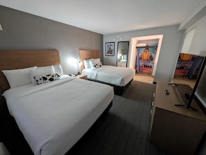 Suite, Multiple Beds, Non Smoking | Desk, laptop workspace, iron/ironing board, free WiFi