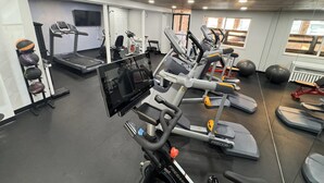 A gym with treadmills, elliptical machines, and free weights. - Comfort Inn & Suites Denver West - Golden (Golden)