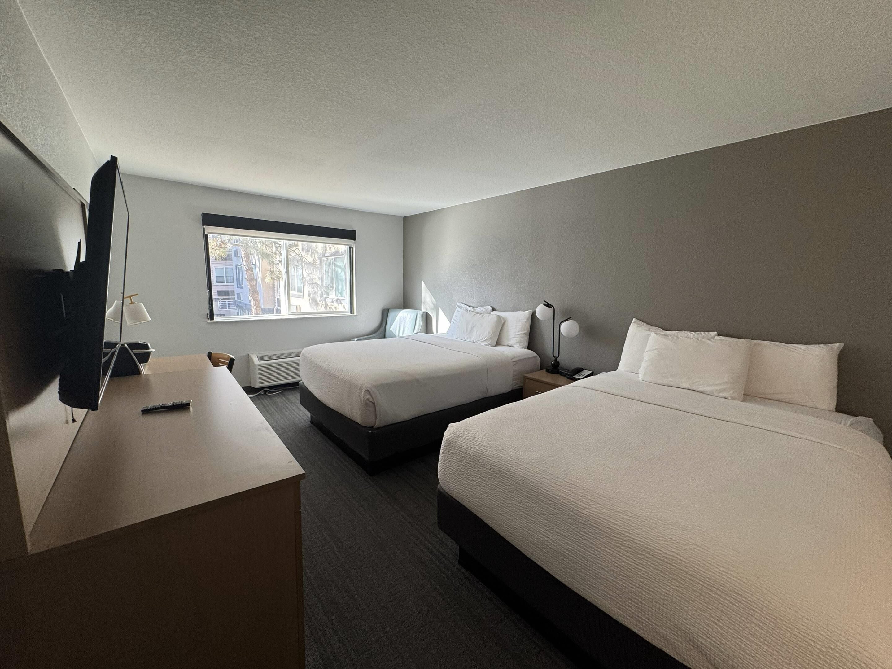 Standard Room, 2 Queen Beds, Non Smoking | Desk, laptop workspace, iron/ironing board, free WiFi