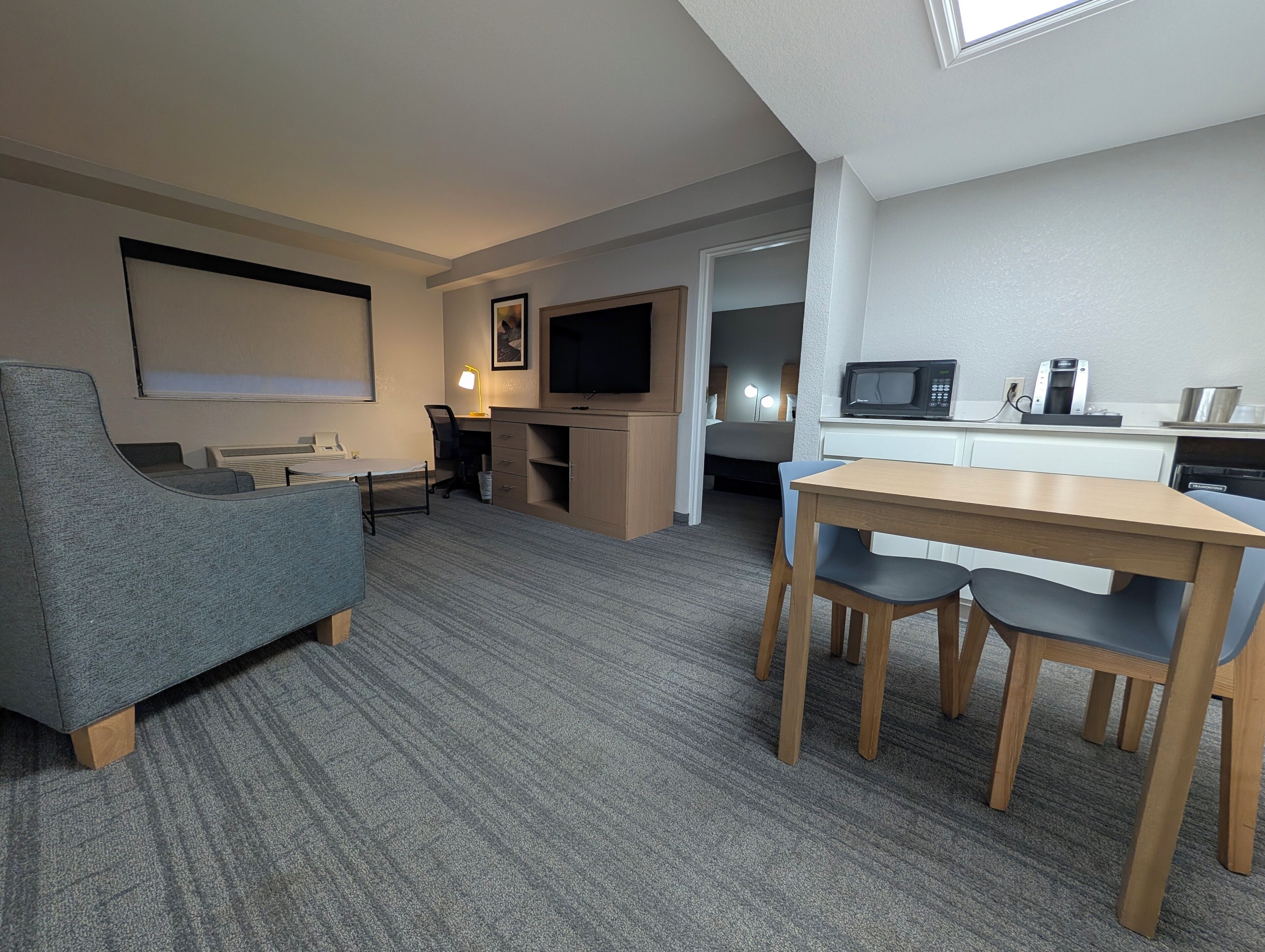 Suite, Multiple Beds, Non Smoking | Living area | 50-inch TV with cable channels