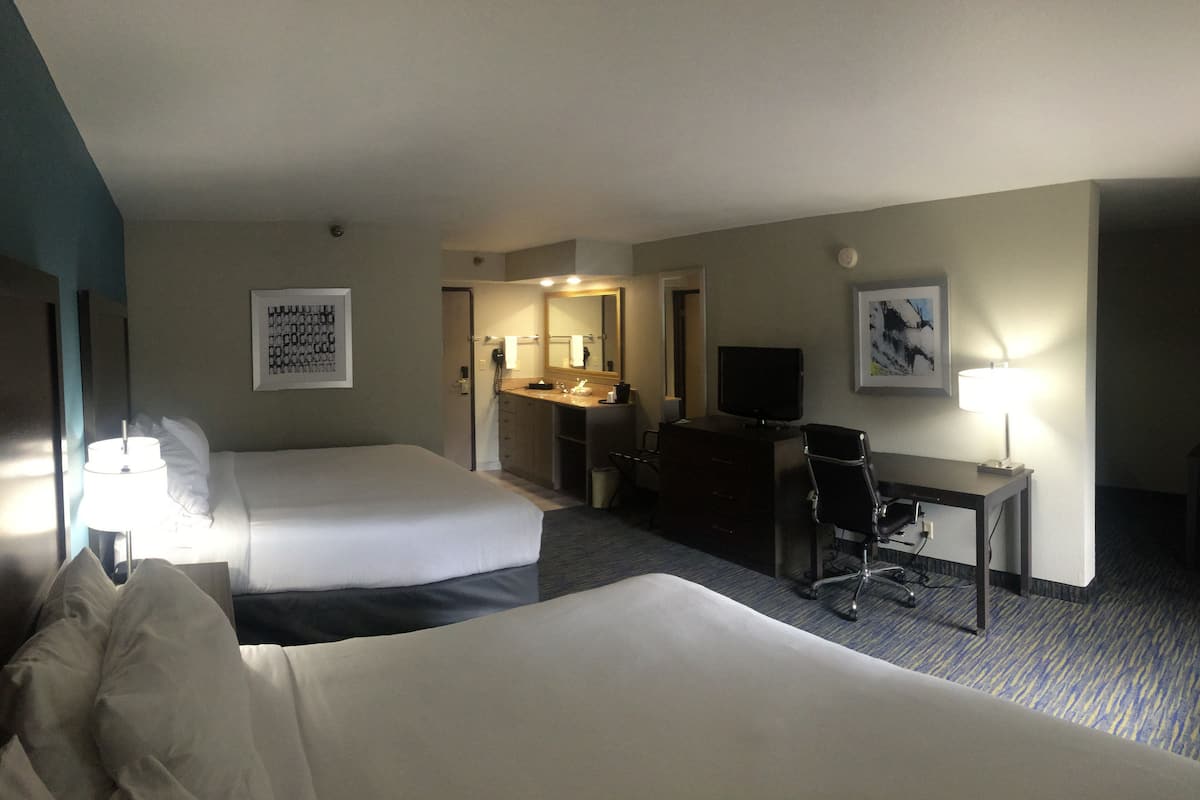 standard room, multiple beds, microwave | in-room safe, desk, iron/ironing board, wifi