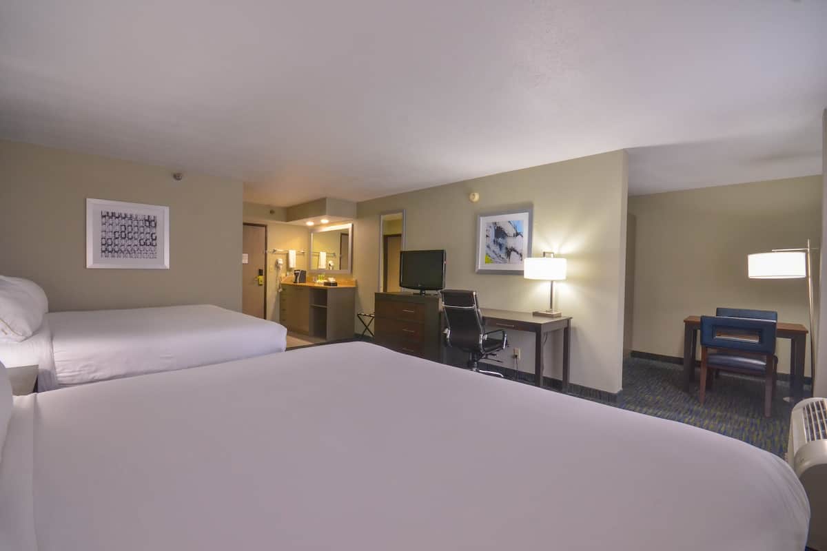 standard room, multiple beds, microwave | in-room safe, desk, iron/ironing board, wifi