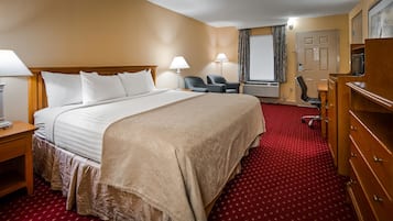 Tabla de planchar con plancha, wifi gratis y ropa de cama