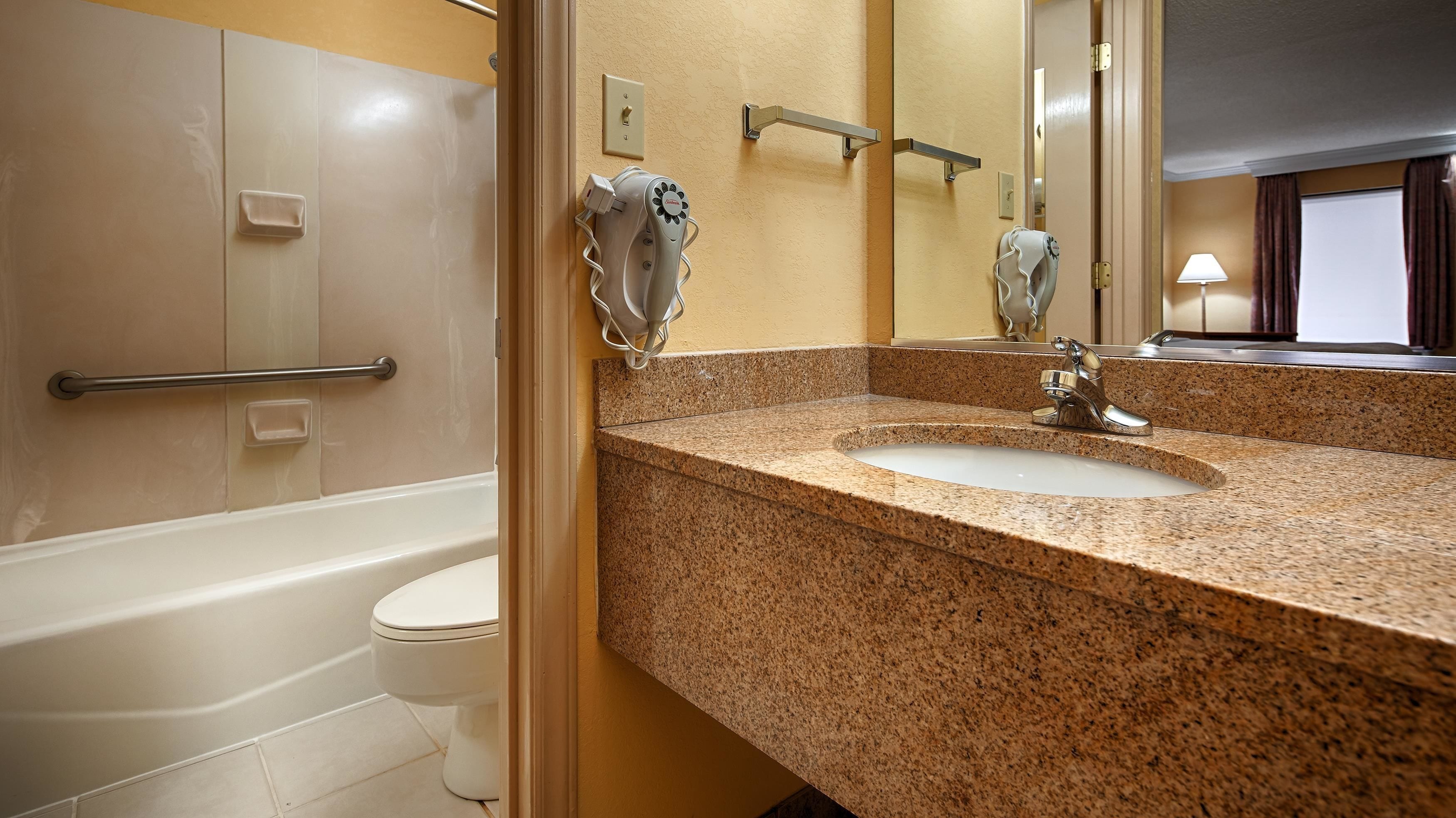 combined shower/bathtub, free toiletries, hair dryer, towels