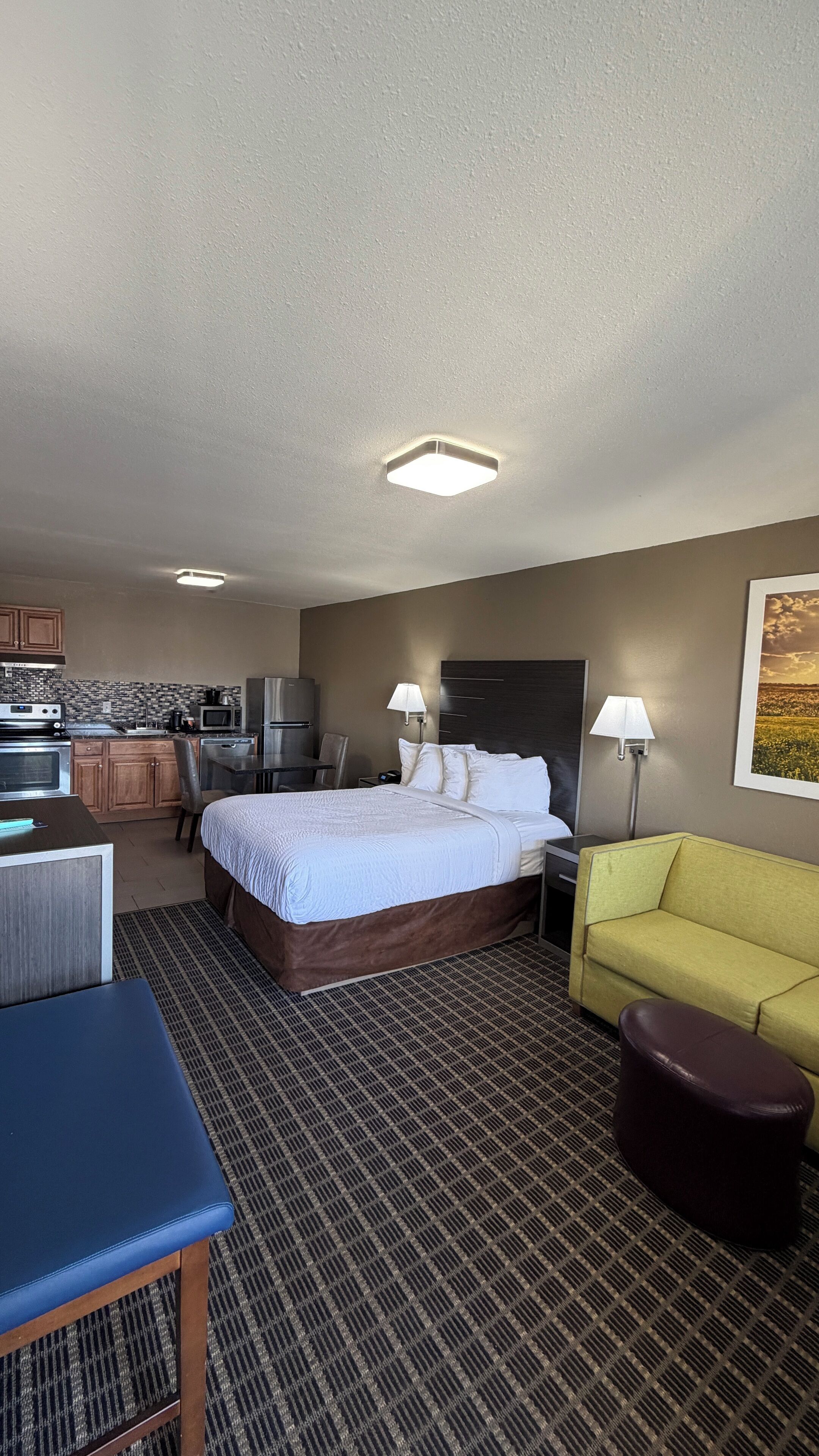 Standard Room, Multiple Beds, Non Smoking | Living area | 32-inch TV with cable channels