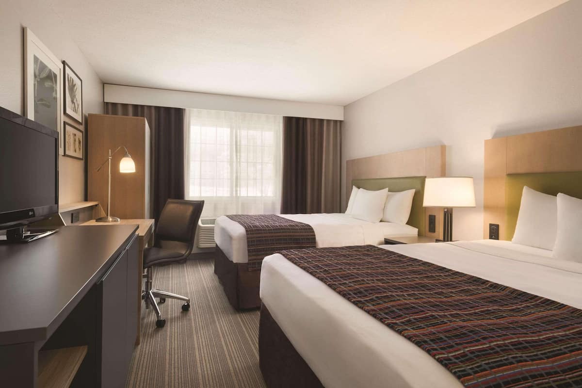 Room, 2 Queen Beds, Non Smoking | Desk, iron/ironing board, cribs (free), WiFi (free)
