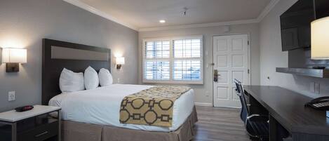 Premium bedding, desk, laptop workspace, iron/ironing board