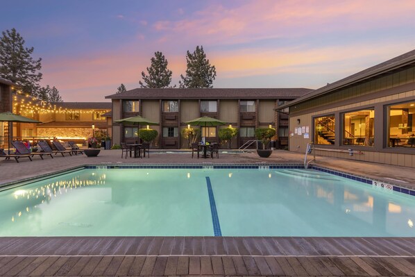 Outdoor pool, pool umbrellas, sun loungers