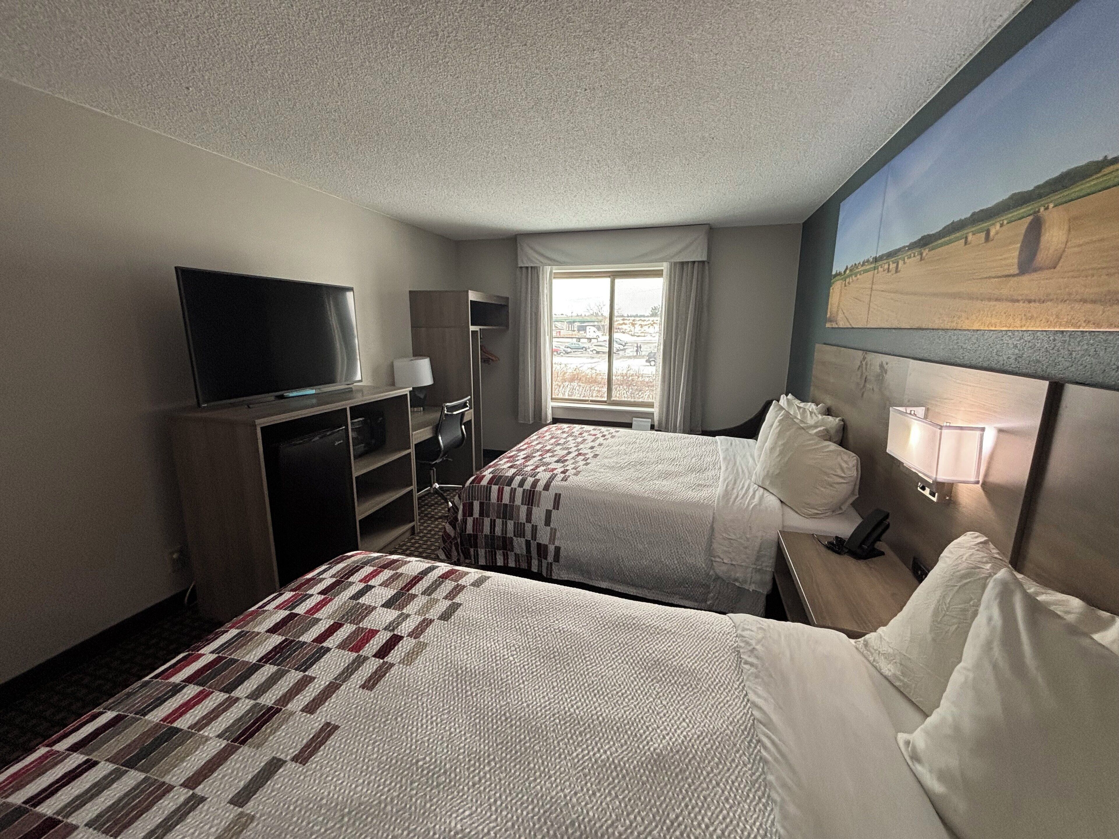 Deluxe Room, 2 Queen Beds, Non Smoking | Desk, laptop workspace, blackout curtains, free cots/infant beds