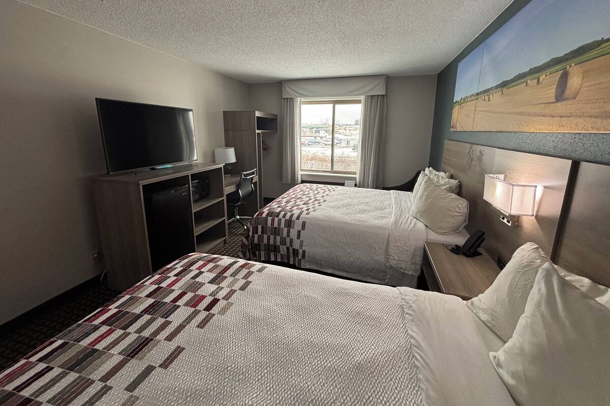 Deluxe Room, 2 Queen Beds, Non Smoking | Desk, laptop workspace, blackout curtains, free cots/infant beds