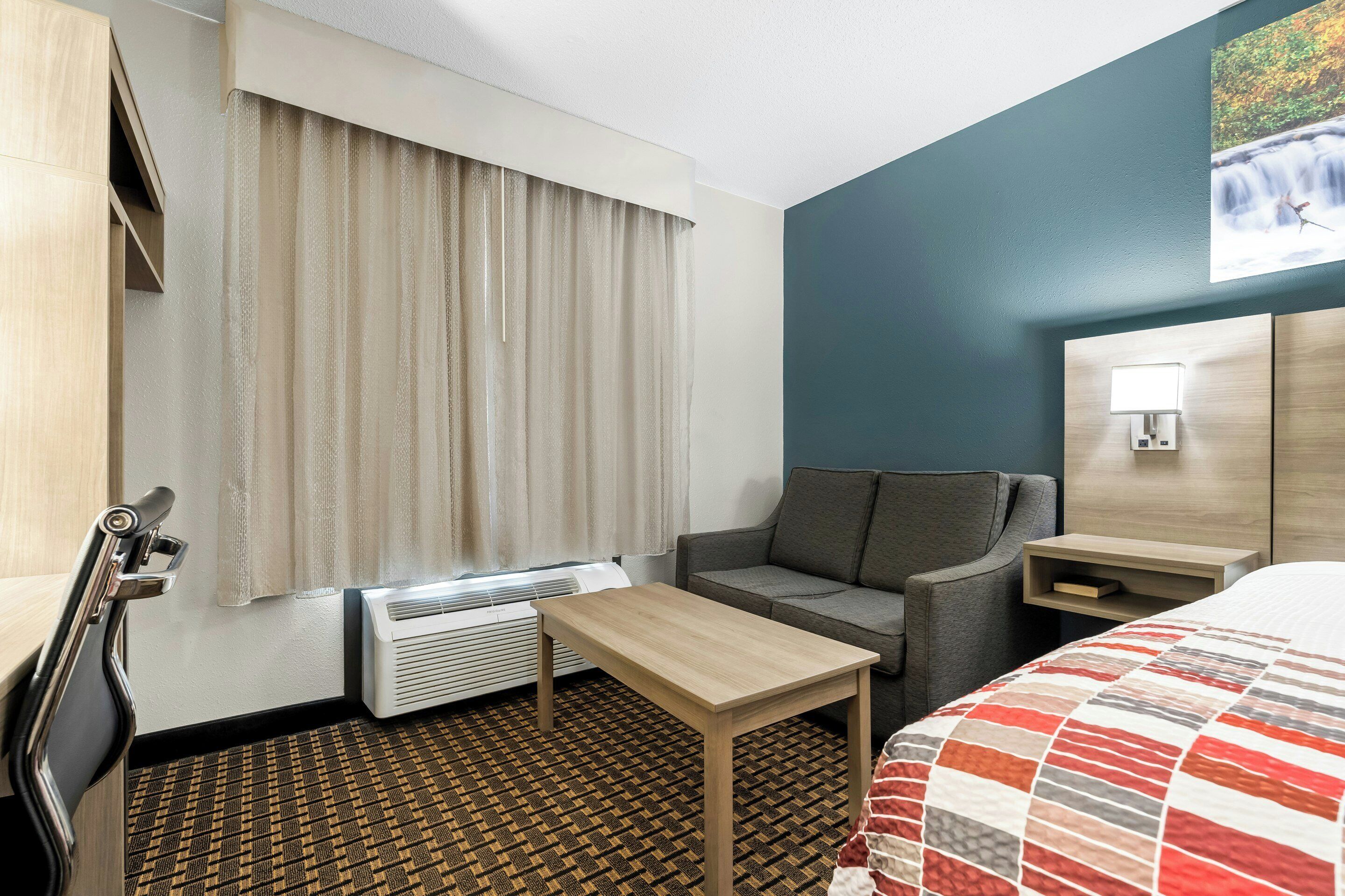 Desk, laptop workspace, blackout curtains, free WiFi