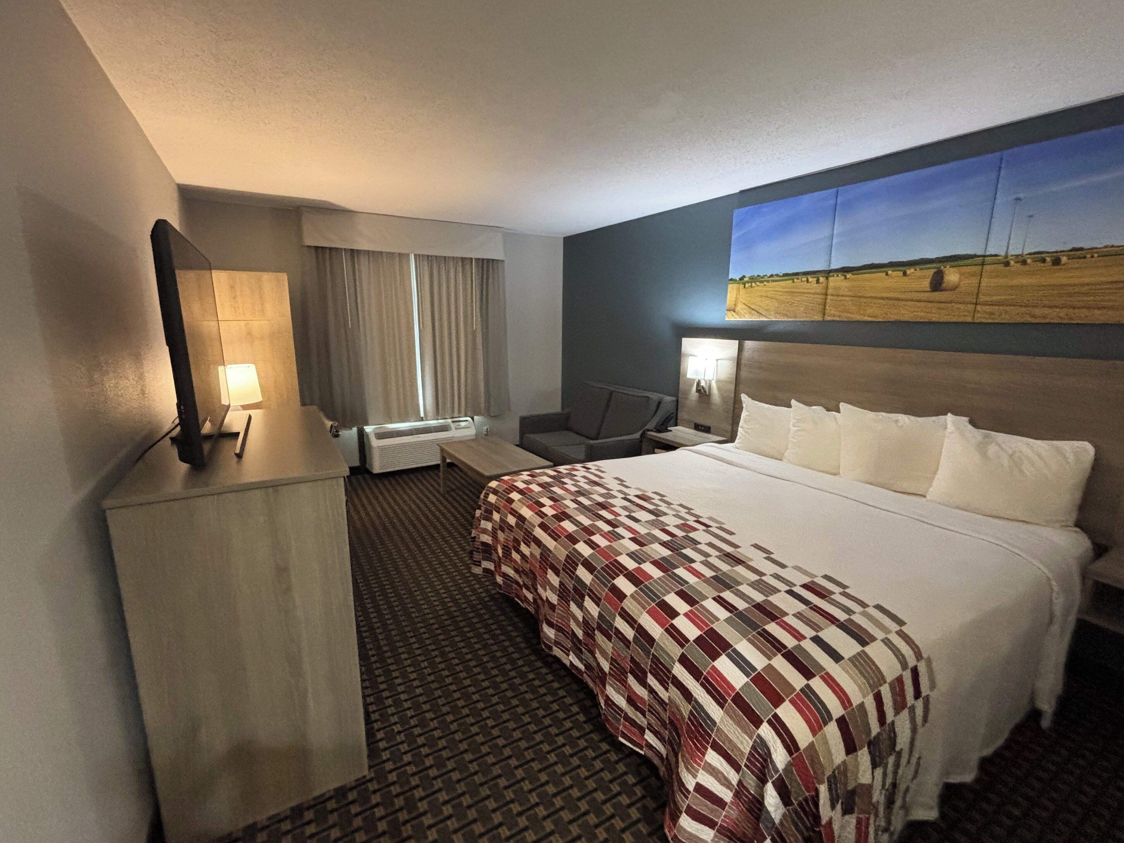 Superior kamer, 1 kingsize bed, niet-roken | Een bureau, een laptopwerkplek, verduisterende gordijnen, gratis wifi