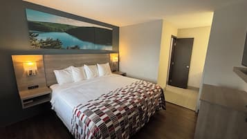 Suite, 1 King Bed, Non Smoking | Desk, laptop workspace, blackout drapes, free cribs/infant beds