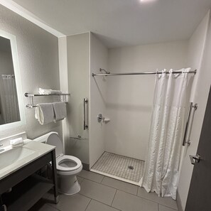 Superior Room, 1 King Bed, Roll-in Shower, Non Smoking | Bathroom | Free toiletries, hair dryer, towels - Red Roof Inn & Suites Tomah (Tomah)