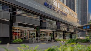 A modern building with the name "Melia Kuala Lumpur" prominently displayed. - Melia Kuala Lumpur (Kuala Lumpur)