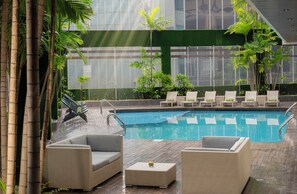 Outdoor pool, open 7:00 AM to 9:00 PM, sun loungers