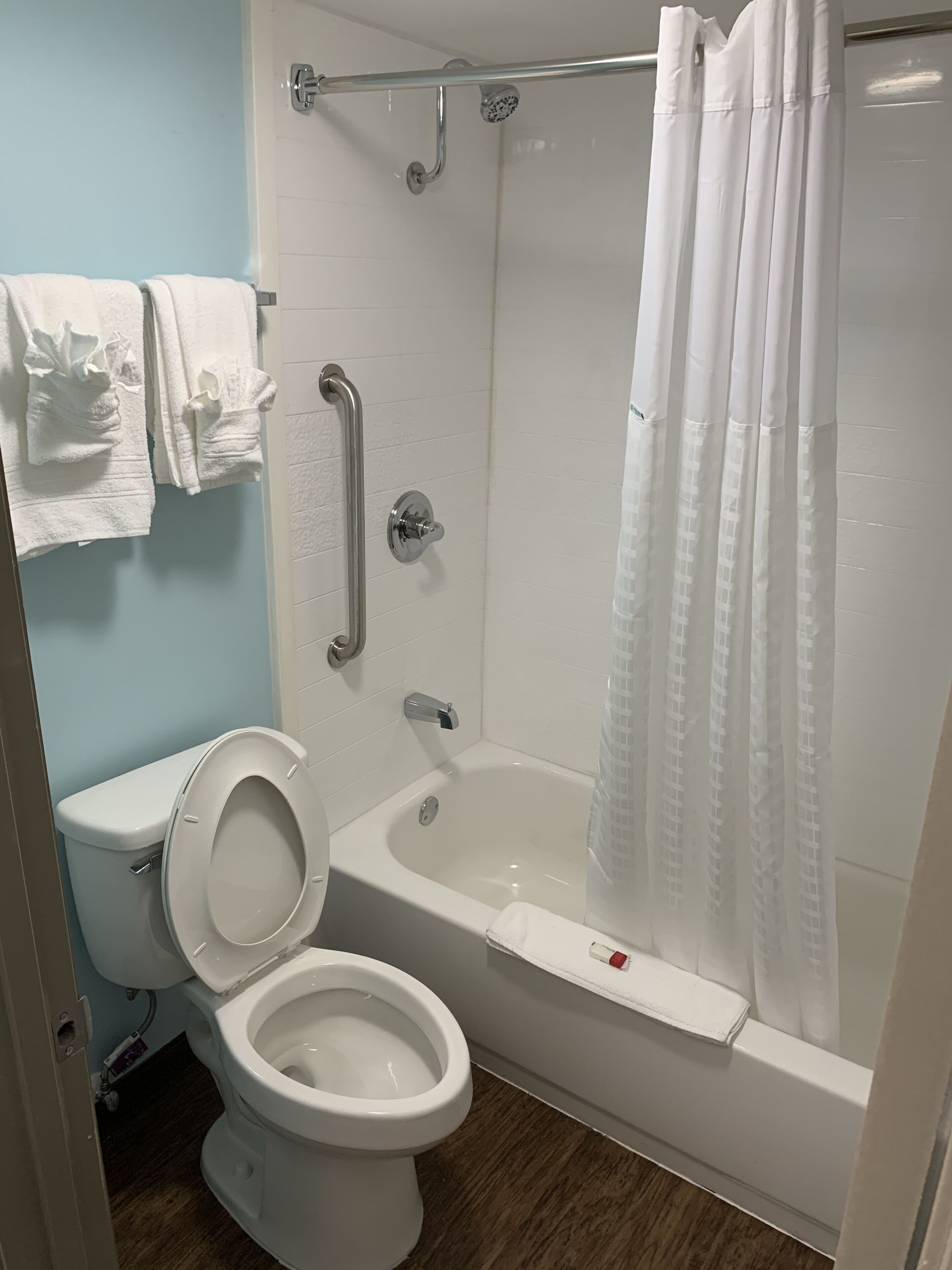 Double Room, 2 Double Beds, Smoking | Bathroom | Combined shower/tub, hair dryer, towels