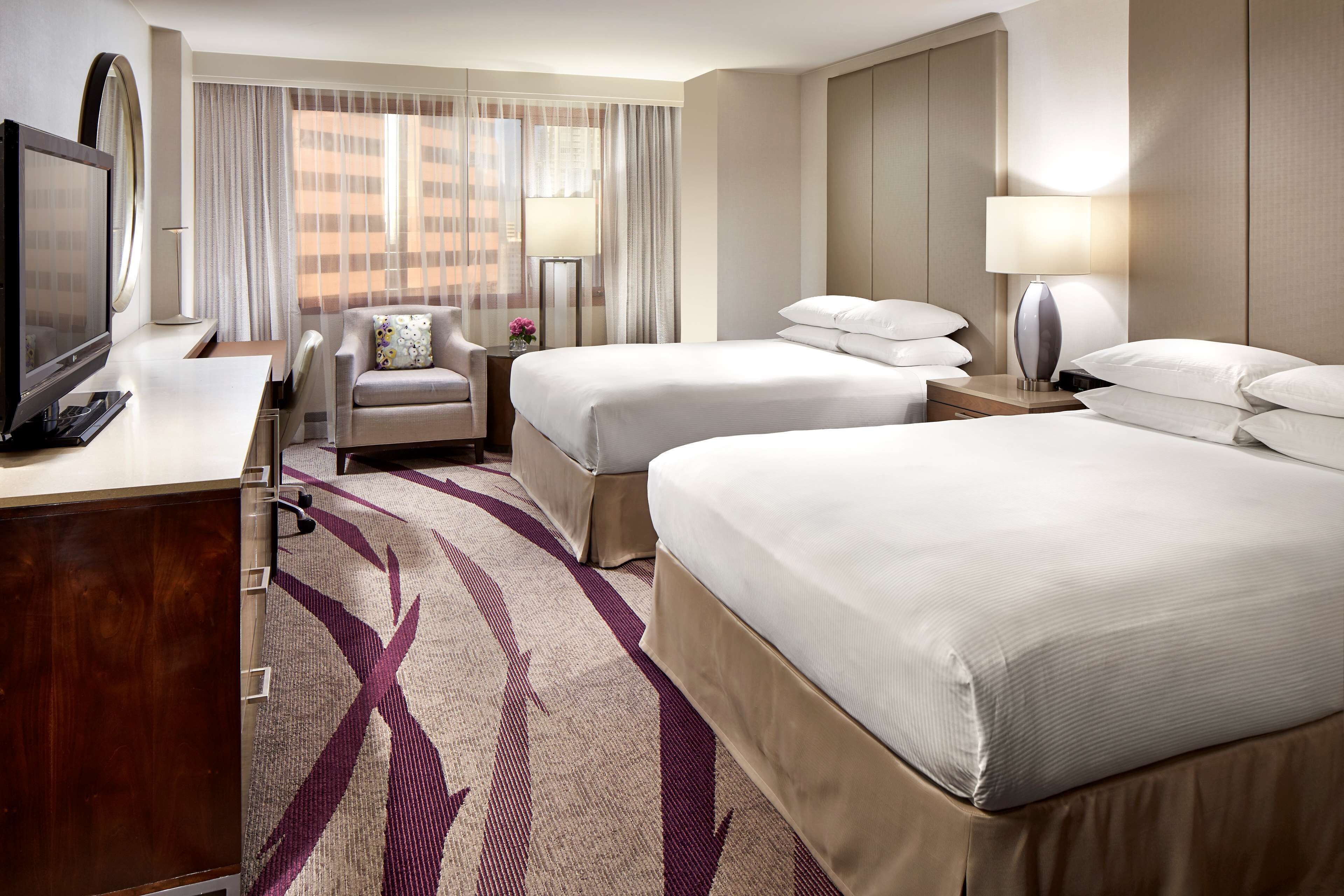 Hypo-allergenic bedding, down comforters, in-room safe, desk