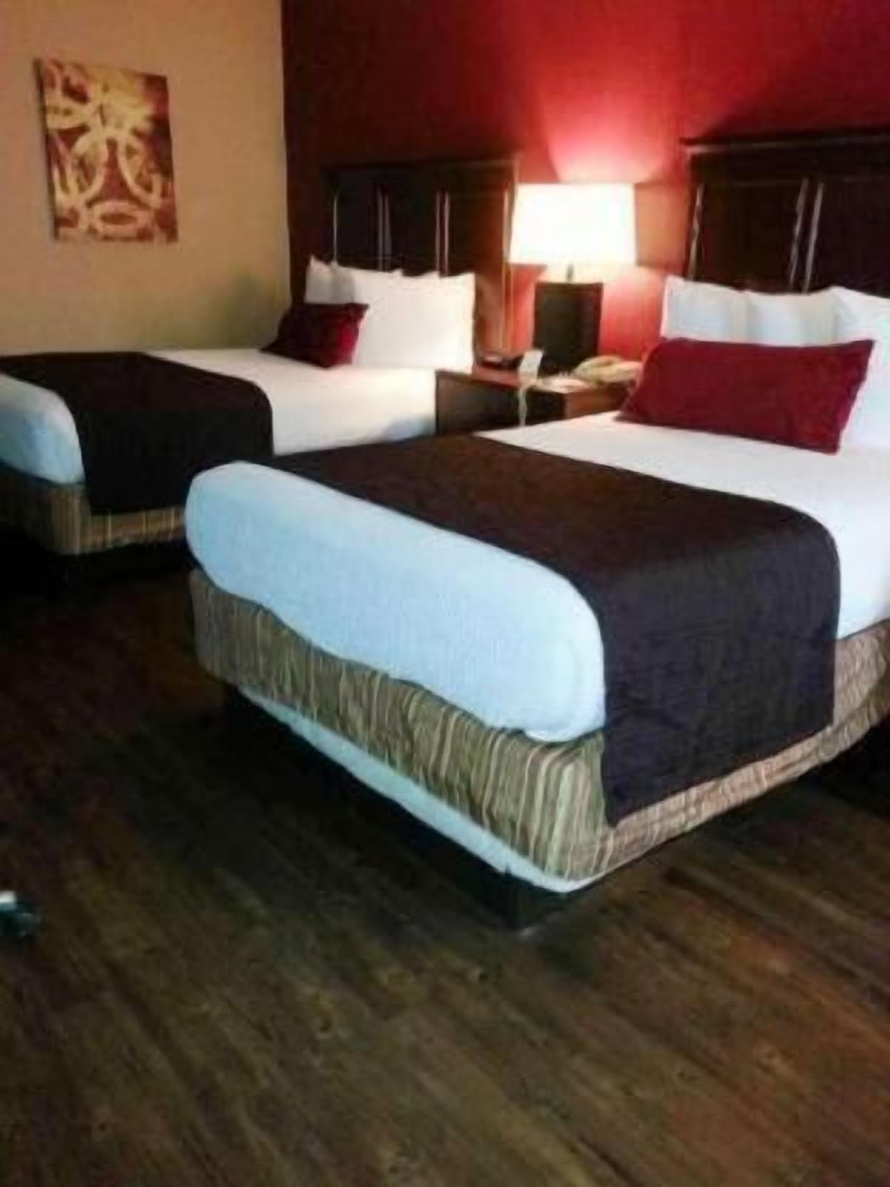 Premium bedding, blackout drapes, iron/ironing board, bed sheets