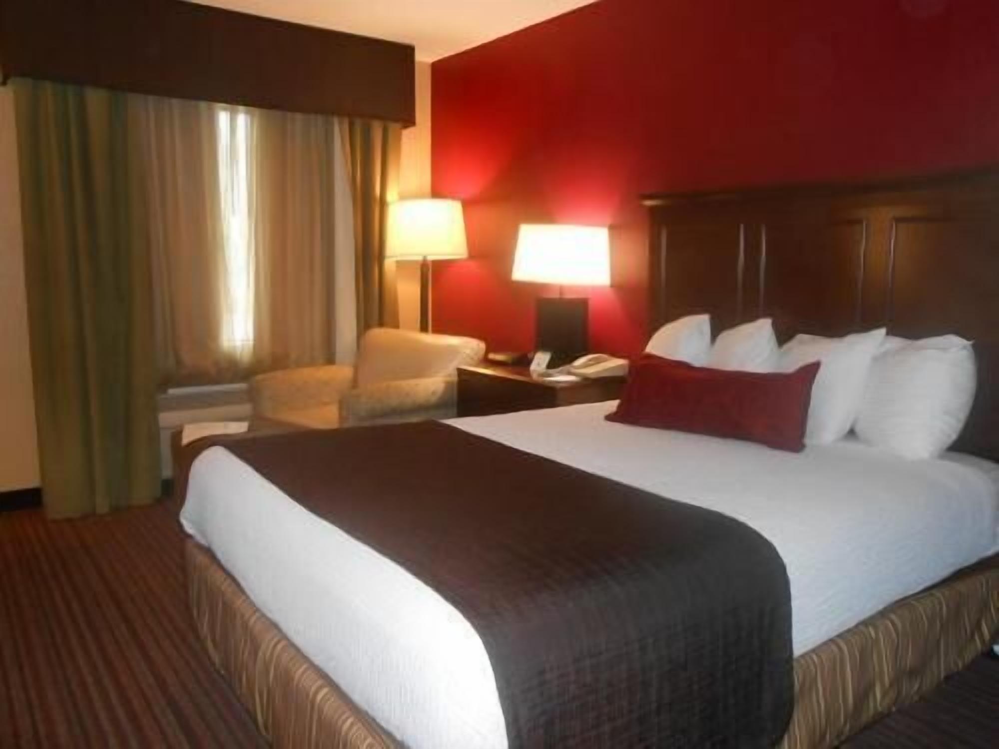 Premium bedding, blackout drapes, iron/ironing board, bed sheets