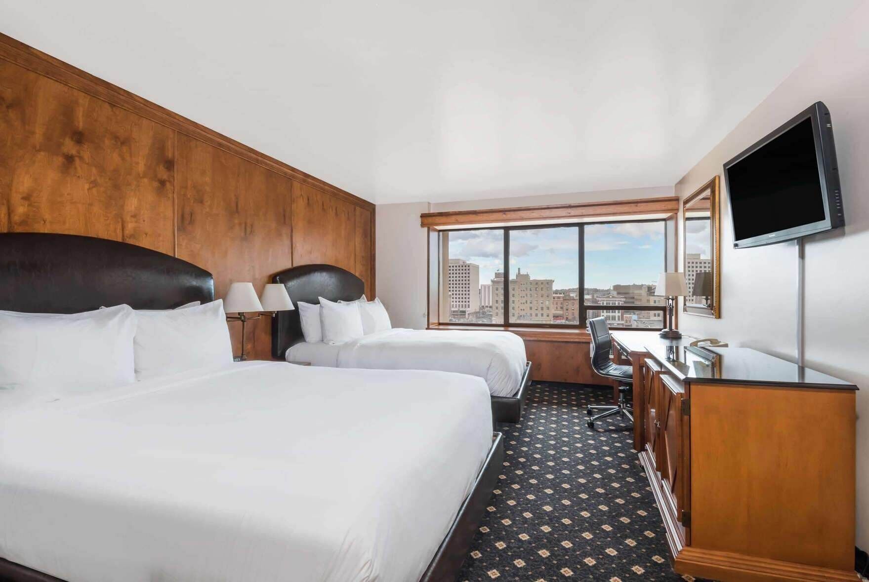 Hypo-allergenic bedding, pillowtop beds, in-room safe, desk
