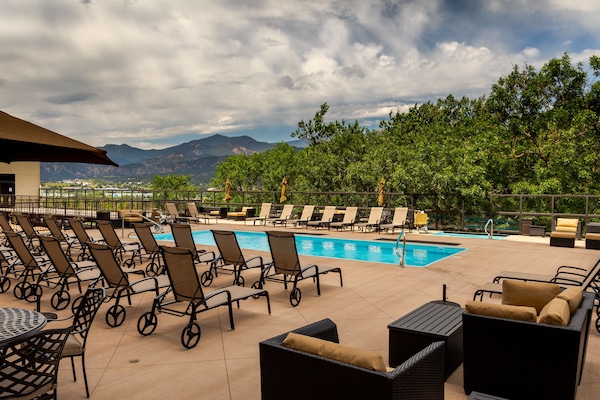 Indoor pool, seasonal outdoor pool, pool umbrellas, sun loungers